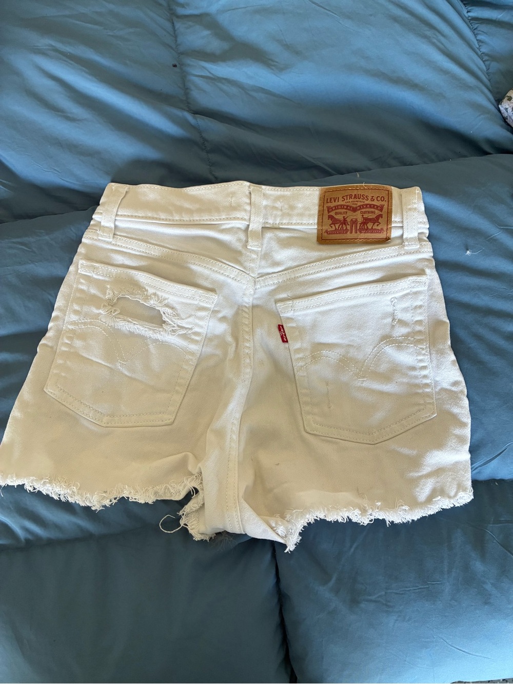 Levi's White Distressed Denim Cutoff Shorts